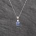 Pre-Owned White Gold Tanzanite & 0.06ct Diamond Pendant & 18 Inch Curb Chain 41143641