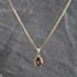Pre-Owned 9ct Yellow Gold Garnet Oval Pendant & 16 Inch Foxtail Chain 41143676
