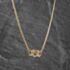 Pre-Owned 9ct Yellow Gold 0.05ct Diamond Triple Heart Gemstone Pendant & 16 Inch Curb Chain 41143744