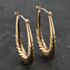 Pre-Owned Yellow Gold 30mm Oval Twist Pattern Creole Earrings 41173491