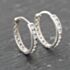 Pre-Owned 9ct White Gold 18.4mm Cubic Zirconia Channel Set Hoop Earrings 41173906