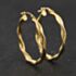 Pre-Owned Yellow Gold Twist 31mm Hoop Earrings 41174360