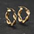 Pre-Owned Yellow Gold 17mm Twist Hoop Earrings 41174568