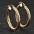 Pre-Owned Yellow Gold 27mm Twist Hoop Earrings 41174579