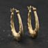 Pre-Owned Yellow Gold 24mm Patterned Creole Earrings 41174586