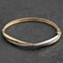 Pre-Owned 9ct Two Colour Gold Crossover Hinged Bangle 41211481