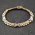 Pre-Owned 9ct Two Colour Gold Kiss Design 7.5 Inch Brick Chain Bracelet 41281990