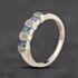 Pre-Owned 9ct White Gold Blue Topaz & Diamond Square Cut Half Eternity Ring 41384351