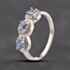 Pre-Owned 9ct White Gold Tanzanite & 0.10ct Diamond Triple Cluster Ring 41384355