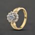 Pre-Owned 9ct Yellow Gold Blue Topaz & 0.04ct Diamond Oval Cluster Ring 41384515