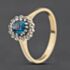 Pre-Owned 9ct Yellow Gold Blue Topaz & 0.15ct Diamond Oval Cluster Ring 41384590
