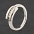 Pre-Owned 9ct White Gold 0.10ct Brilliant Cut Diamond Five Stone Ring 41384637