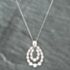 Pre-Owned Platinum 1.11ct Brilliant Cut Diamond Oval Two Row Pendant & 18 Inch Curb Chain 43141033