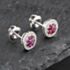 Pre-Owned 14ct White Gold 0.60ct Ruby & 0.25ct Brilliant Cut Diamond Round Cluster Stud Earrings 43171223