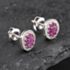 Pre-Owned 14ct White Gold 0.70ct Ruby & 0.25ct Diamond Oval 9mm Stud Earrings 43171229