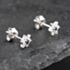 Pre-Owned 9ct White Gold 0.09ct Sapphire & 0.24ct Diamond Flower Cluster Stud Earrings 43171259