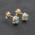 Pre-Owned 9ct Yellow Gold 0.28ct Emerald & Diamond Oval Cluster Stud Earrings 43171304