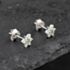 Pre-Owned 9ct White Gold 0.06ct Emerald & 0.24ct Diamond Flower Cluster Stud Earrings 43171334