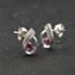Pre-Owned 9ct White Gold 0.06ct Ruby & 0.01ct Diamond Swirl 11.3mm Stud Earrings 43171464