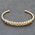 Pre-Owned 18ct Yellow Gold Ruby & 0.90ct Diamond Flexible Multi Cluster Medium Torque Bangle 43211015