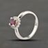 Pre-Owned Platinum 0.38ct Ruby & 0.08ct Brilliant Cut Diamond Oval Cluster Ring 43351070