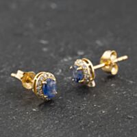 Pre-Owned 18ct Yellow Gold 0.20ct Sapphire & 0.04ct Brilliant Cut Diamond Oval Stud Earrings 41174046
