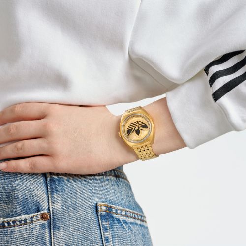 Adidas Unisex Edition One Gold Sunray & Black Logo Watch on wrist