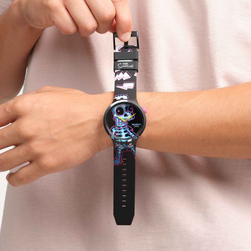 Shop Swatch Simpsons AYE CARUMBOO Watches